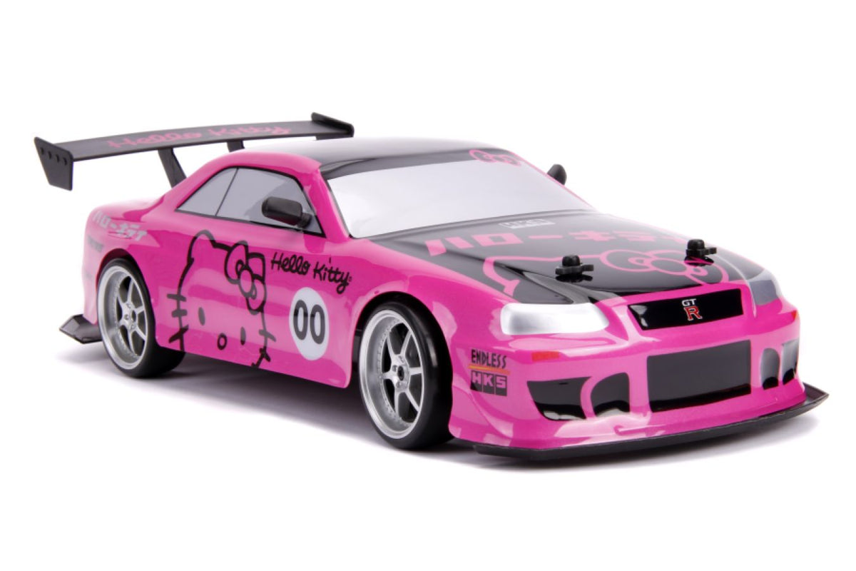ミニカー Hello Kitty 2002 Nissan Skyline GT-R Jada Toys 1/24 2002 Nissan Skyline GT-R (BNR34) with Hello